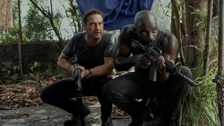 Gerard Butler as Brodie Torrance and Mike Colter as Louis Gaspare in Plane. Photo Credit: Kenneth Rexach