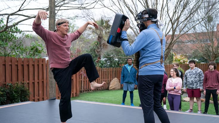 Cobra Kai. (L to R) William Zabka as Johnny Lawrence, Ralph Macchio as Daniel LaRusso in Cobra Kai. Cr. Curtis Bond Baker/Netflix Â© 2021