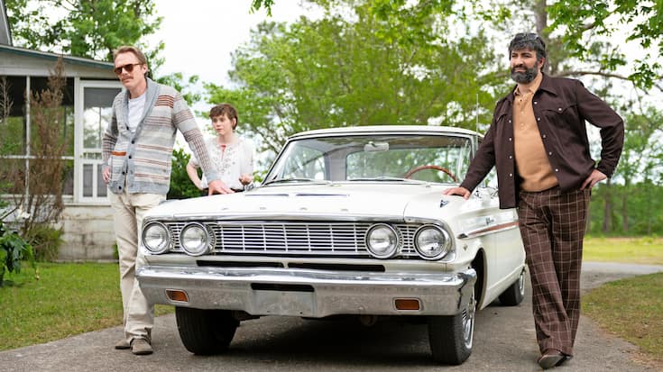 (L-R) Paul Bettany as "Frank," Sophia Lillis as "Beth," and Peter Macdissi as "Wally" in UNCLE FRANK Photo: Brownie Harris/Amazon Studios