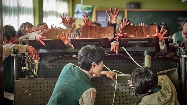All of us are Dead (L to R) Yoon Chan-young as Lee Cheong-san, Park Ji-hu as Nam On-jo in All of us are Dead Cr. Yang Hae-sung/Netflix Â© 2021