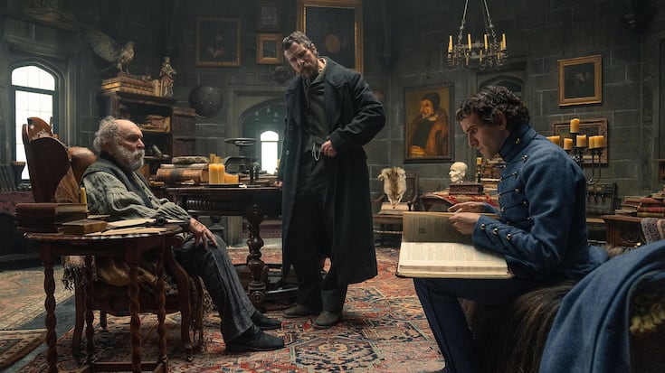 The Pale Blue Eye. (L to R) Robert Duvall as Jean Pepe, Christian Bale as Augustus Landor and Harry Melling as Edgar Allen Poe in The Pale Blue Eye.  Cr. Scott Garfield/Netflix Â© 2022