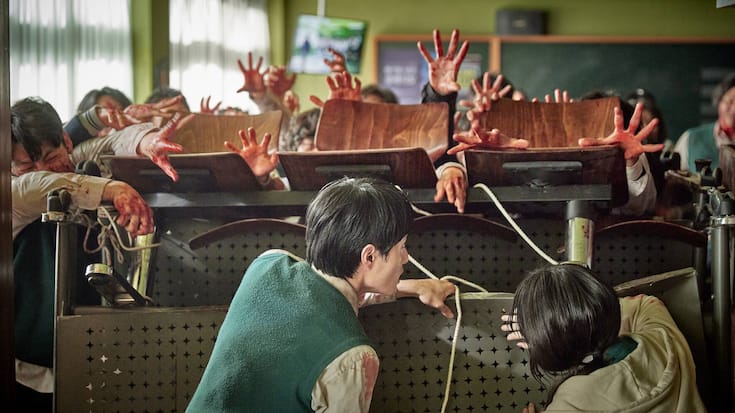 All of us are Dead (L to R) Yoon Chan-young as Lee Cheong-san, Park Ji-hu as Nam On-jo in All of us are Dead Cr. Yang Hae-sung/Netflix Â© 2021