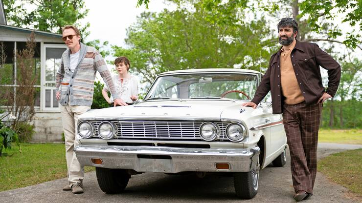 (L-R) Paul Bettany as "Frank," Sophia Lillis as "Beth," and Peter Macdissi as "Wally" in UNCLE FRANK Photo: Brownie Harris/Amazon Studios