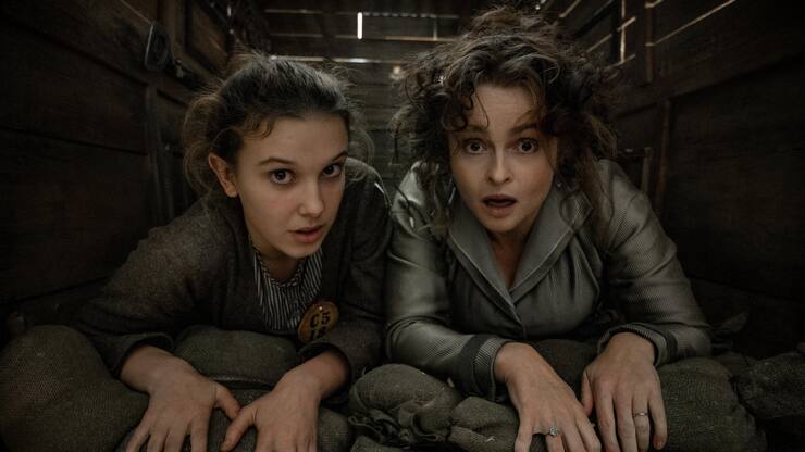 Enola Holmes 2. Millie Bobby Brown as Enola Holmes, Helena Bonham Carter as Eudoria Holmes. Cr. Alex Bailey/Netflix Â© 2022