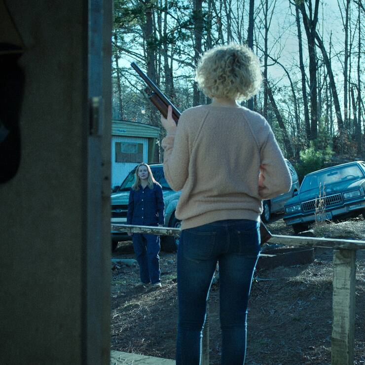 Ozark. (L to R) Laura Linney as Wendy Byrde, Julia Garner as Ruth Langmore in episode 402 of Ozark. Cr. Courtesy of Netflix © 2021