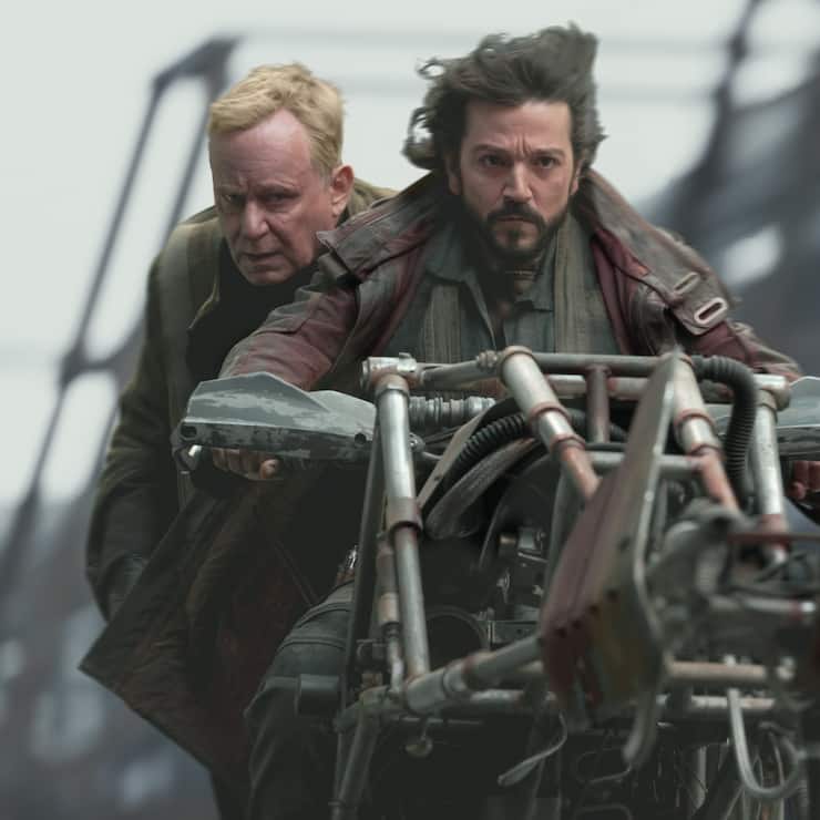 (L-R): Luthen Rael (Stellan Skarsgard) and Cassian Andor (Diego Luna) in Lucasfilm's ANDOR, exclusively on Disney+. ©2022 Lucasfilm Ltd. & TM. All Rights Reserved.