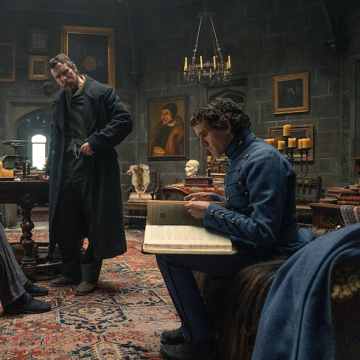 The Pale Blue Eye. (L to R) Robert Duvall as Jean Pepe, Christian Bale as Augustus Landor and Harry Melling as Edgar Allen Poe in The Pale Blue Eye.  Cr. Scott Garfield/Netflix Â© 2022