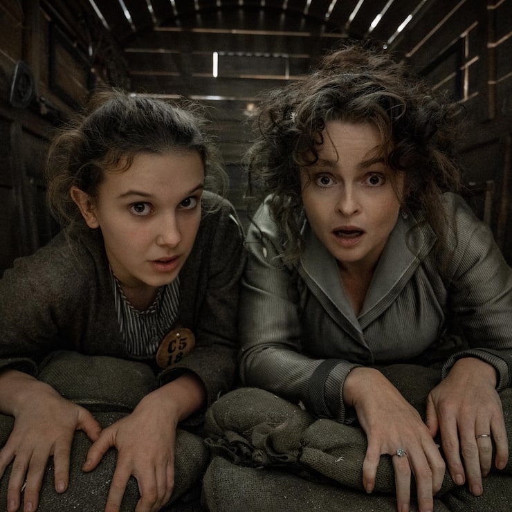 Enola Holmes 2. Millie Bobby Brown as Enola Holmes, Helena Bonham Carter as Eudoria Holmes. Cr. Alex Bailey/Netflix Â© 2022