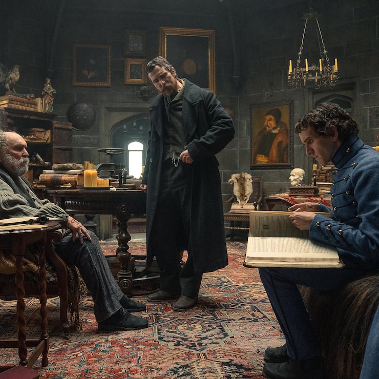 The Pale Blue Eye. (L to R) Robert Duvall as Jean Pepe, Christian Bale as Augustus Landor and Harry Melling as Edgar Allen Poe in The Pale Blue Eye.  Cr. Scott Garfield/Netflix Â© 2022