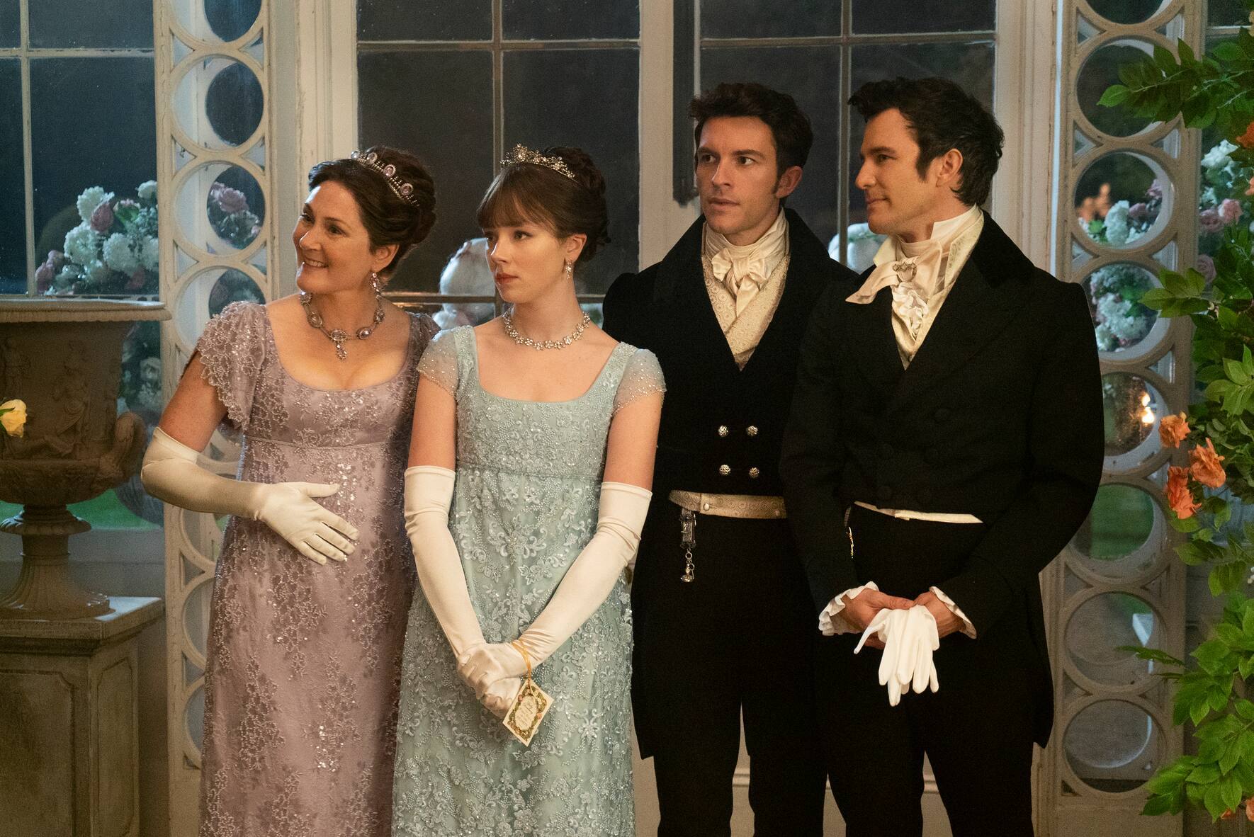 Bridgerton. (L to R) Ruth Gemmell as Lady Violet Bridgerton, Claudia Jessie as Eloise Bridgerton, Jonathan Bailey as Anthony Bridgerton, and Luke Thomspon as Benedict Bridgerton in episode 201 of Bridgerton. Cr. Liam Daniel/Netflix Â© 2021