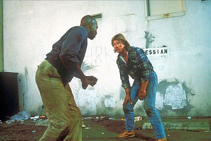 THEY LIVE, Keith David, Roddy Piper, 1988, Universal/courtesy Everett Collection Universal/Courtesy Everett Collection ACHTUNG AUFNAHMEDATUM GESCHÃTZT PUBLICATIONxINxGERxSUIxAUTxONLY Copyright: xUniversal/CourtesyxEverettxCollectionx MCDTHLI EC011